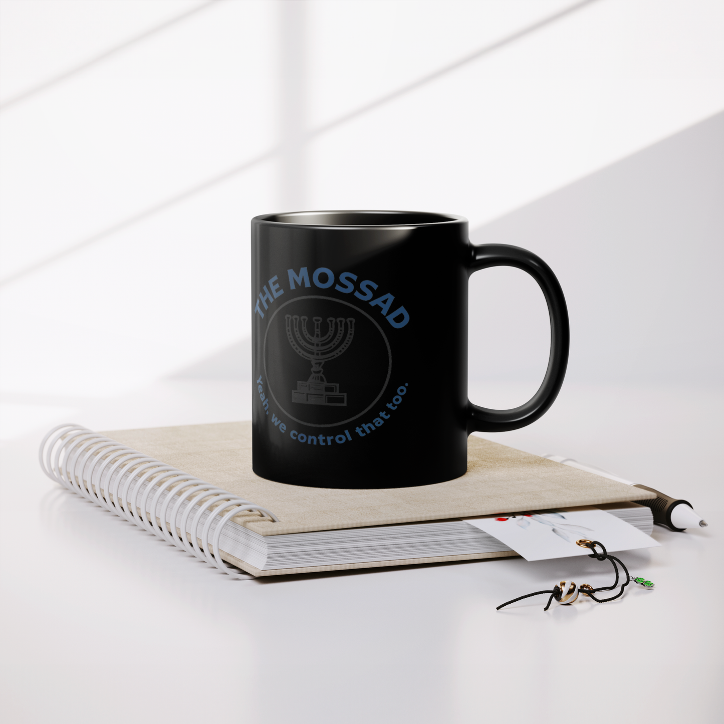 The_Mossad_Yeah_We_Control_That_Too__Lifestyle_Notebook_Mockup.png
