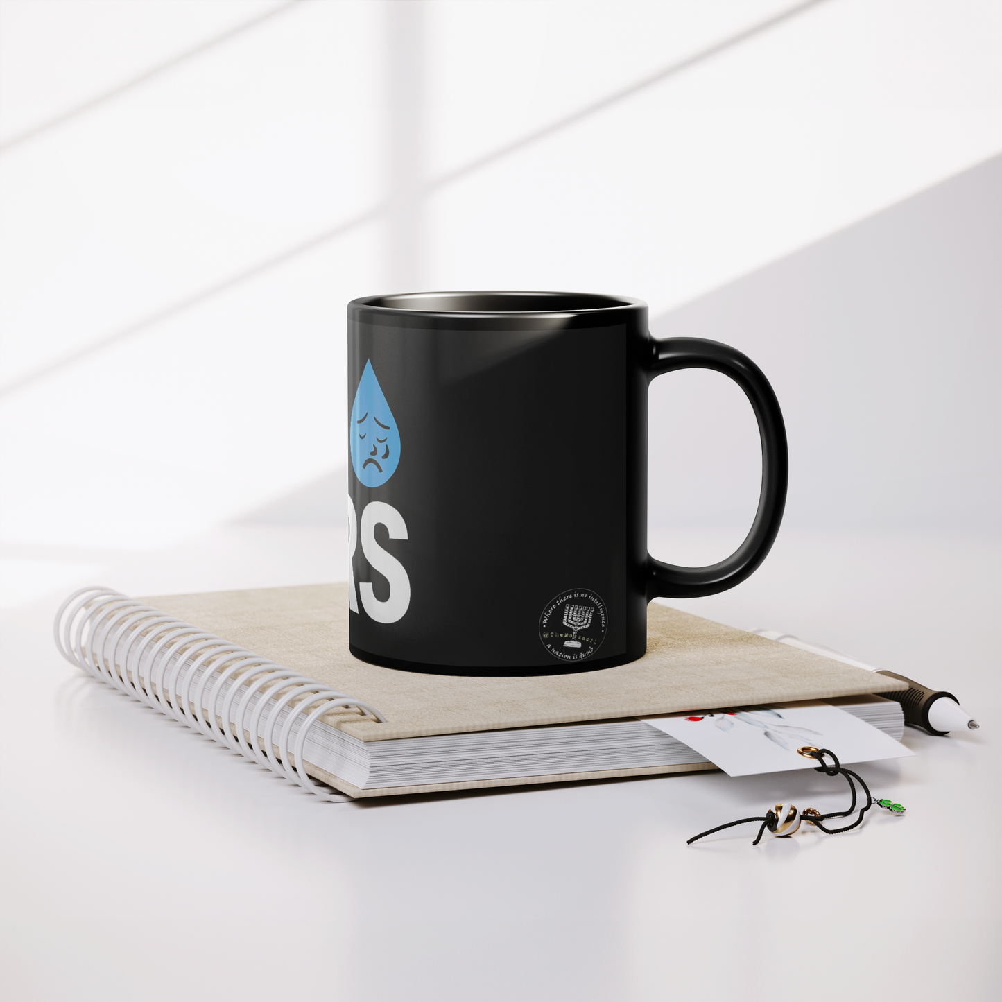 BDS_Tears_11_oz_Coffee_Mug_Lifestyle_Notebook_Mockup.png