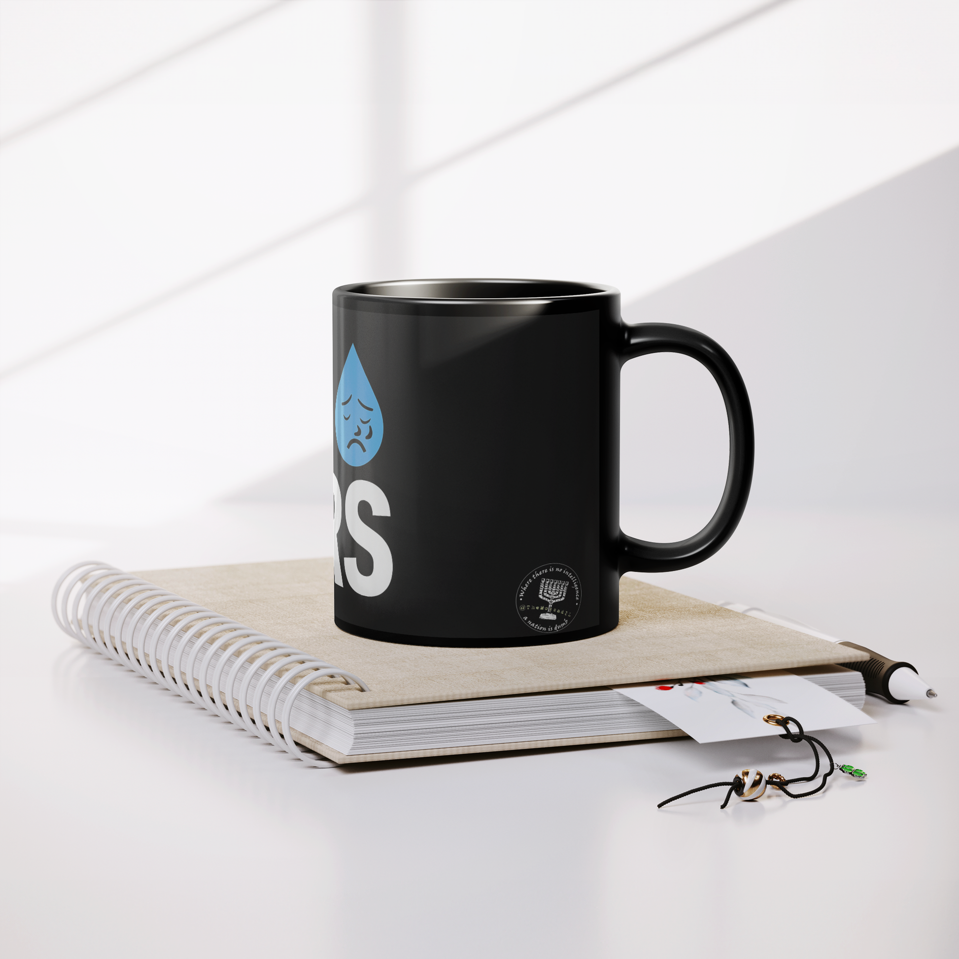 BDS_Tears_11_oz_Coffee_Mug_Lifestyle_Notebook_Mockup.png