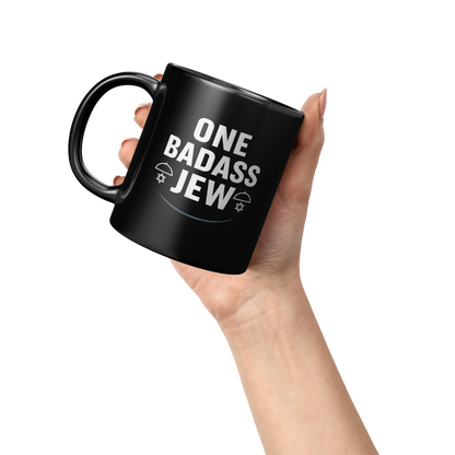 One_Badass_Jew_Black_Mug_11oz_Lifestyle_Raised_Hand_LH_Mockup.png